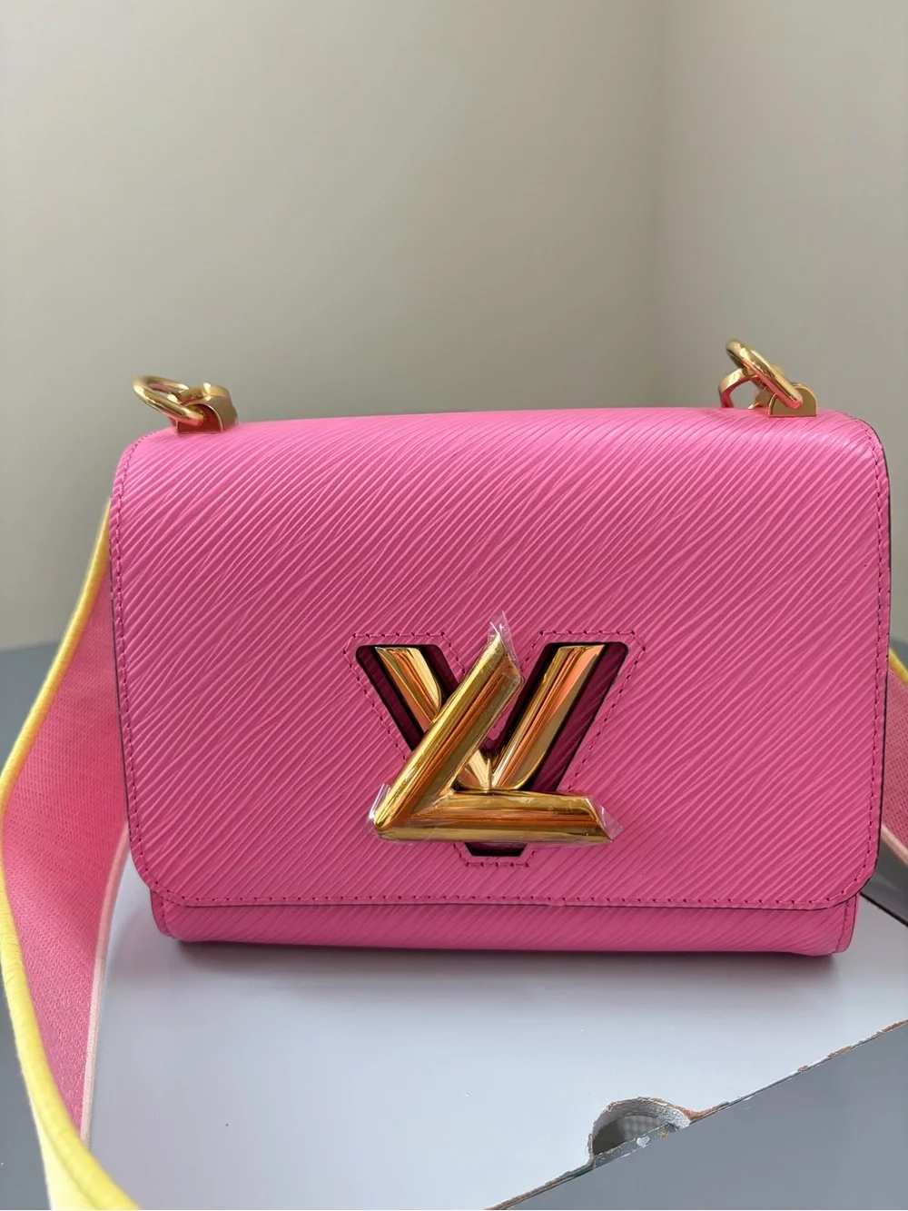 Louis Vuitton Pink Twist Compact Crossbody Bag with Gold Hardware